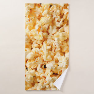 Tasty popcorn on whole background. Food Bath Towel
