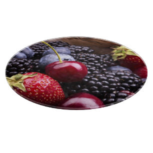 Tasty Summer Fruits On A Wooden Table Cutting Board