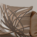 Taupe and Brown Neutral Abstract Ribbons Cushion<br><div class="desc">Taupe and brown throw pillow features an artistic neutral abstract ribbon composition with shades of taupe and brown with white accents on a neutral taupe background. The warm neutral hues of taupe blend beautifully with dark brown to create a neutral modern pattern that's sure to compliment any room in your...</div>
