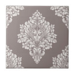 Taupe and Cream Damask Tile<br><div class="desc">A light taupe damask pattern on a darker taupe background creates this striking ceramic tile design. Beautiful for a kitchen backsplash,  bathroom tub,  shower and countertop tile,  or any area (not for outdoor use.) MATCHING items in our store.</div>