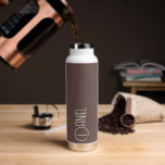 Taupe Modern Typography Personalised Water Bottle<br><div class="desc">Trendy,  vacuum insulated water bottle that features personalised name in white,  modern typography on a taupe colour background. Personalise bottle by editing name and replacing name with your own as desired. Perfect for a birthday gift,  wedding groomsman gift,  etc. Select your water bottle style. Select your water bottle style.</div>
