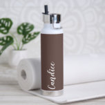 Taupe Personalised Wedding Bridesmaid Water Bottle<br><div class="desc">Gift your wedding bridesmaid or maid of honour with this trendy, vacuum Insulated water bottle that features her name in white, stylised script on a taupe colour background designed to match your wedding colour scheme. Personalise bottle by editing and replacing name with your own as desired. Select your water bottle...</div>