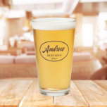 Taupe Stylised Name Wedding Best Man Glass<br><div class="desc">Beer glass for the wedding Best Man that features his name printed in a trendy taupe colour,  stylised script inside a taupe colour oval border along with wedding year date. Personalise your beer glass by editing and replacing name and date with your own.</div>