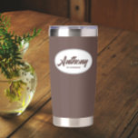 Taupe Stylised Wedding Groomsman Name Insulated Tumbler<br><div class="desc">Gift your wedding groomsman with this trendy and personalised,  stainless steel,  thermal tumbler with his name in stylised script in a white oval design. Background colour and script is taupe. Personalise your thermal tumbler by editing and replacing groomsman's name with desired name.</div>