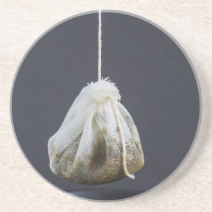 Tea bag is hung in a cup coaster
