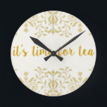 Tea Time Round Clock<br><div class="desc">This elegant yet simple clock will always tell you what time it really is! Makes a great gift for anyone who enjoys a good cup of tea, or who owns a tea shop. Ordering is safe, simple, fast, and fun. Like us: facebook.com/ShopJandL Be sure to browse all of our stores...</div>