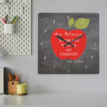 Teacher name | Red apple blackboard thank you Square Wall Clock<br><div class="desc">A big red apple and your custom text inside on a school chalkboard background. Personalise this wall clock with your teacher's name and grade! It could be a thoughtful and cute thank you gift for your teacher on appreciation day,  graduation day or when going back to school.</div>