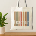 Teacher Tote Bag<br><div class="desc">This Teacher's Tote Bag is decorated with stripes in earth tones and the word Teacher in stylish typography.
Makes a perfect gift for a new teacher or as a thank-you gift for a special teacher.</div>