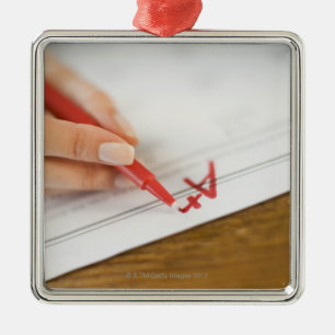 Teacher writing A plus grade on worksheet Metal Tree Decoration