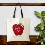 Teacher's Shiny Apple Tote Bag<br><div class="desc">The classic shiny red apple on this fun,  custom gift.  Ready to personalise with her monogram & name.</div>