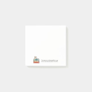 Teacup on stack of books note