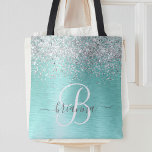 Teal Brushed Metal Silver Glitter Monogram Name Tote Bag<br><div class="desc">Easily personalise this trendy chic tote bag design featuring pretty silver sparkling glitter on a teal brushed metallic background.</div>