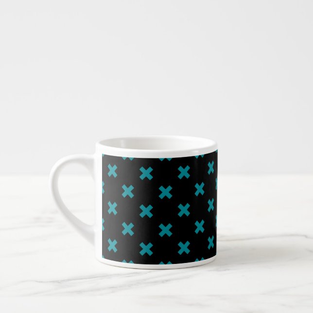 Teal cross stitches on black espresso cup (Left)