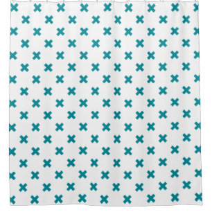 Teal cross stitches on white shower curtain