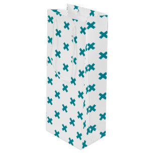 Teal cross stitches on white wine gift bag