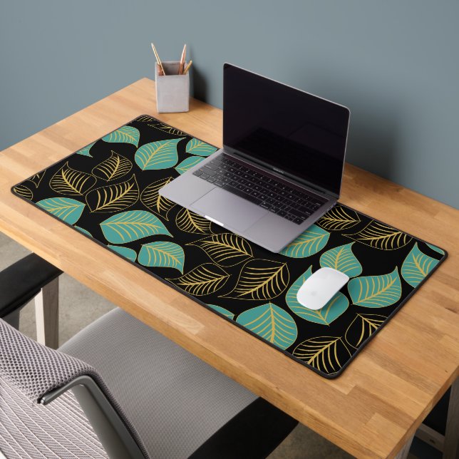 Teal green gold broad leaves pattern on black desk mat (Office 2)