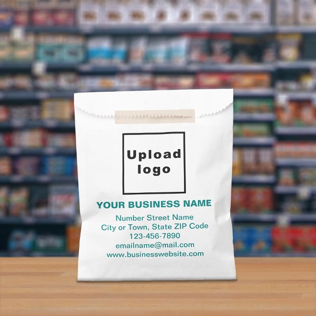 Teal Green Text Business Brand on Paper Bag (Paper bag with teal green text business branding displayed in a store)