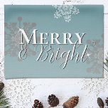 Teal Merry and Bright Snowflakes Christmas Tea Towel<br><div class="desc">Add a charming touch to your kitchen this holiday season with a Teal Merry and Bright Snowflakes Christmas Holiday Kitchen Towel. Kitchen towel design features falling snowflakes with the greeting Merry and Bright in a modern font and a soft white overlay. Additional gift and holiday items available with this design...</div>