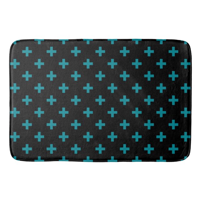 Teal polka crosses on black bath mat (Front)