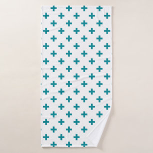 Teal polka crosses on white bath towel