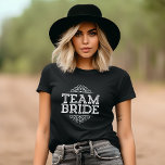 Team Bride Bachelorette Wedding Party Bridesmaid T-Shirt<br><div class="desc">Cute trendy typography design reads "Team Bride" with fancy scroll frame. Perfect gift for bride,  bridesmaids and wedding party to wear while getting ready on your wedding day! Use the design tools to personalize the design or choose a different t-shirt or sweatshirt style or color.</div>