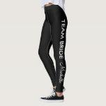 Team Bride bridesmaids leggings for bachelorette<br><div class="desc">Team Bride bridesmaids leggings for bachelorette or wedding party. Cute black and white typography design. Custom athleisure leggings. Casual sports clothing for women and teen girls. Personalizable tights with custom background colour. Make your own custom printed pants for bachelorette, wedding, bridal party, engagement, popular sports, school, workout, gymnastics, dance, gym,...</div>