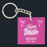 Team Bride Coquette Bow Bridesmaid Gift Key Ring<br><div class="desc">Show your appreciation with our Team Bride Coquette Bow Bridesmaid Gift Keychain! Featuring a dainty bow design and a touch of feminine charm, this elegant keychain is the perfect token of gratitude for your bridal party. Stylish and practical, it’s a keepsake your bridesmaids can carry with them every day, reminding...</div>