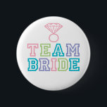 Team Bride with Diamond Ring 6 Cm Round Badge<br><div class="desc">Fun Team Bride buttons to wear the day of the Bridal Shower,  Bachelorette Party,  Rehearsal Dinner and/or Wedding Day. Colourful lettering in Pink,  Teal,  Lime and Purple. For enquiries about custom design changes by the independent designer please email paula@labellarue.com BEFORE you customise or place an order.</div>