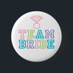 Team Bride with Diamond Ring 6 Cm Round Badge<br><div class="desc">Fun Team Bride buttons to wear the day of the Bridal Shower,  Bachelorette Party,  Rehearsal Dinner and/or Wedding Day. Colourful lettering in Pink,  Teal,  Lime and Purple. For enquiries about custom design changes by the independent designer please email paula@labellarue.com BEFORE you customise or place an order.</div>