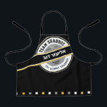 Team Shabbos Kid's Apron on Black with Hebrew<br><div class="desc">Our TREAM SHABBOS Apron on Black is a cool way to get everyone on board with Shabbos prep. Get one for every member of the team and watch them pitch in! ALL text on this branded look can be customised. Practical & fun... Just like your family. Includes the words: TGI...</div>