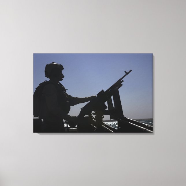 Technician manning an M240 machine gun in Iraq Canvas Print (Front)