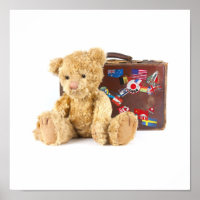 teddy bear and vintage old suitcase with world sti
