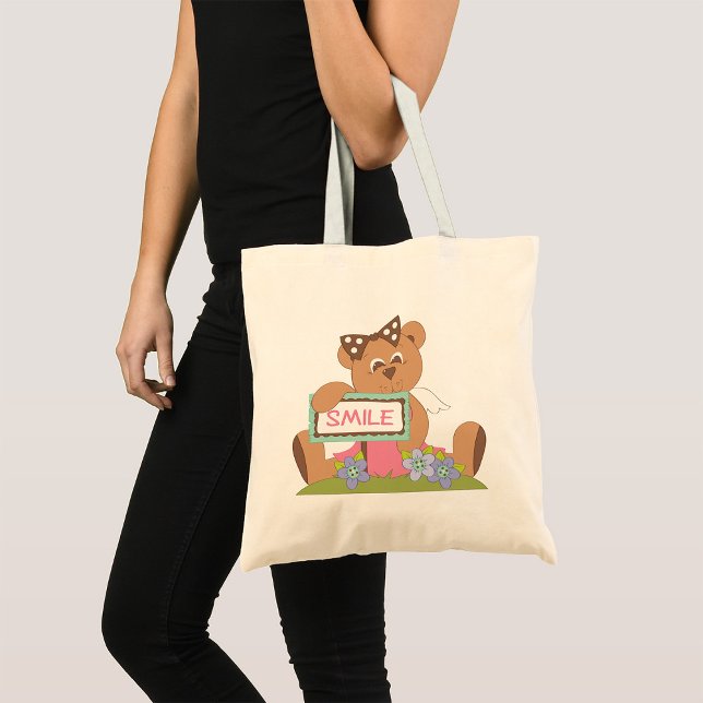 Teddy Bear with Bow Holding Smile Sign  Tote Bag (Creator Uploaded)