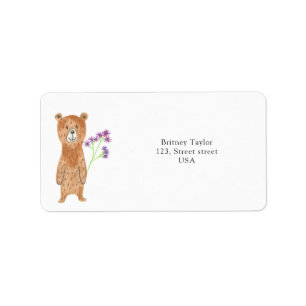 Teddy bear with flower label