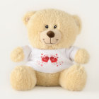 Teddy bear with red hearts.
