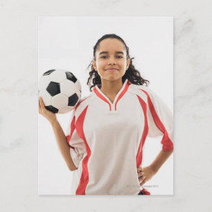 Teen girl holding soccer ball in hand, portrait postcard