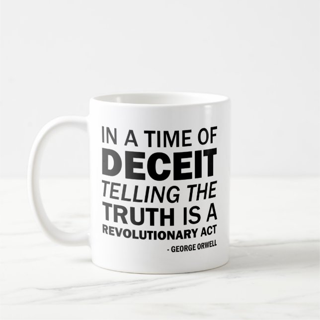 Telling the truth is a revolutionary act  coffee mug (Left)