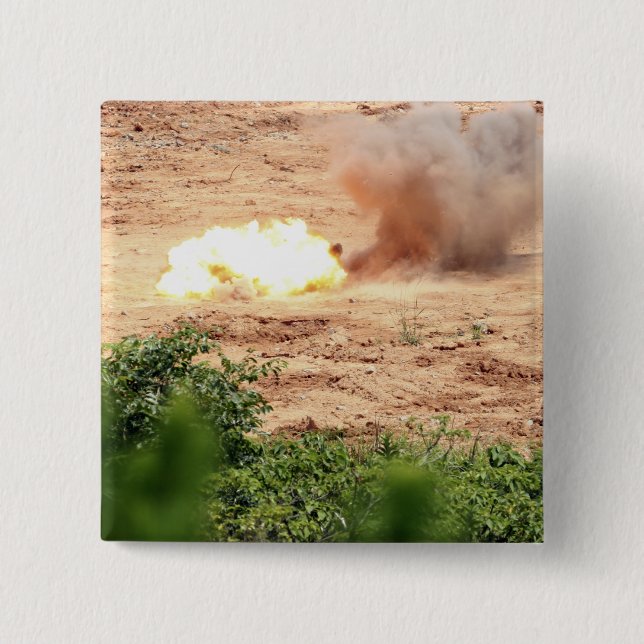 Ten half-pound blocks of TNT 15 Cm Square Badge (Front)