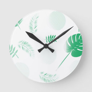 Tender green leaves on white round clock
