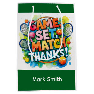Tennis ball and racket on the court with name medium gift bag