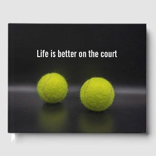 Tennis ball on black background life on court  guest book