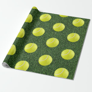 Tennis ball on green grass wrapping paper