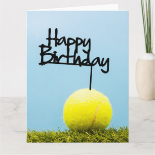 Tennis ball with Happy Birthday Sign on blue sky Card