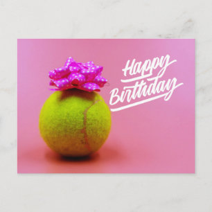 Tennis ball with happy birthday word on pink post postcard