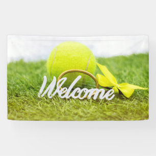 Tennis balls and rackets welcome word on green banner