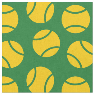 Tennis balls on green background fabric