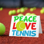 Tennis Love Holiday Card<br><div class="desc">I love playing tennis. A cute tennis player Christmas gift with a yellow tennis ball as the O in Love. Peace and Tennis written in blue and green.</div>