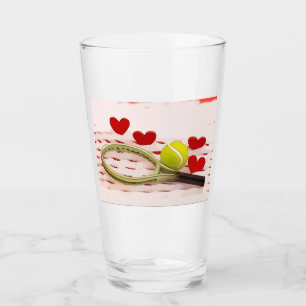 Tennis racket with ball and red heart love glass