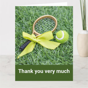 Tennis with racket and balls on green grass thank you card