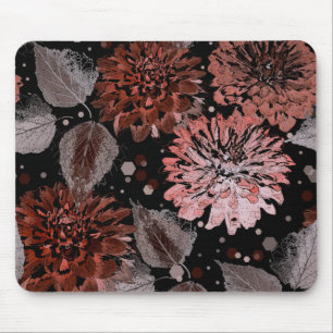 Terracotta flowers with grey leaves on a black mouse pad
